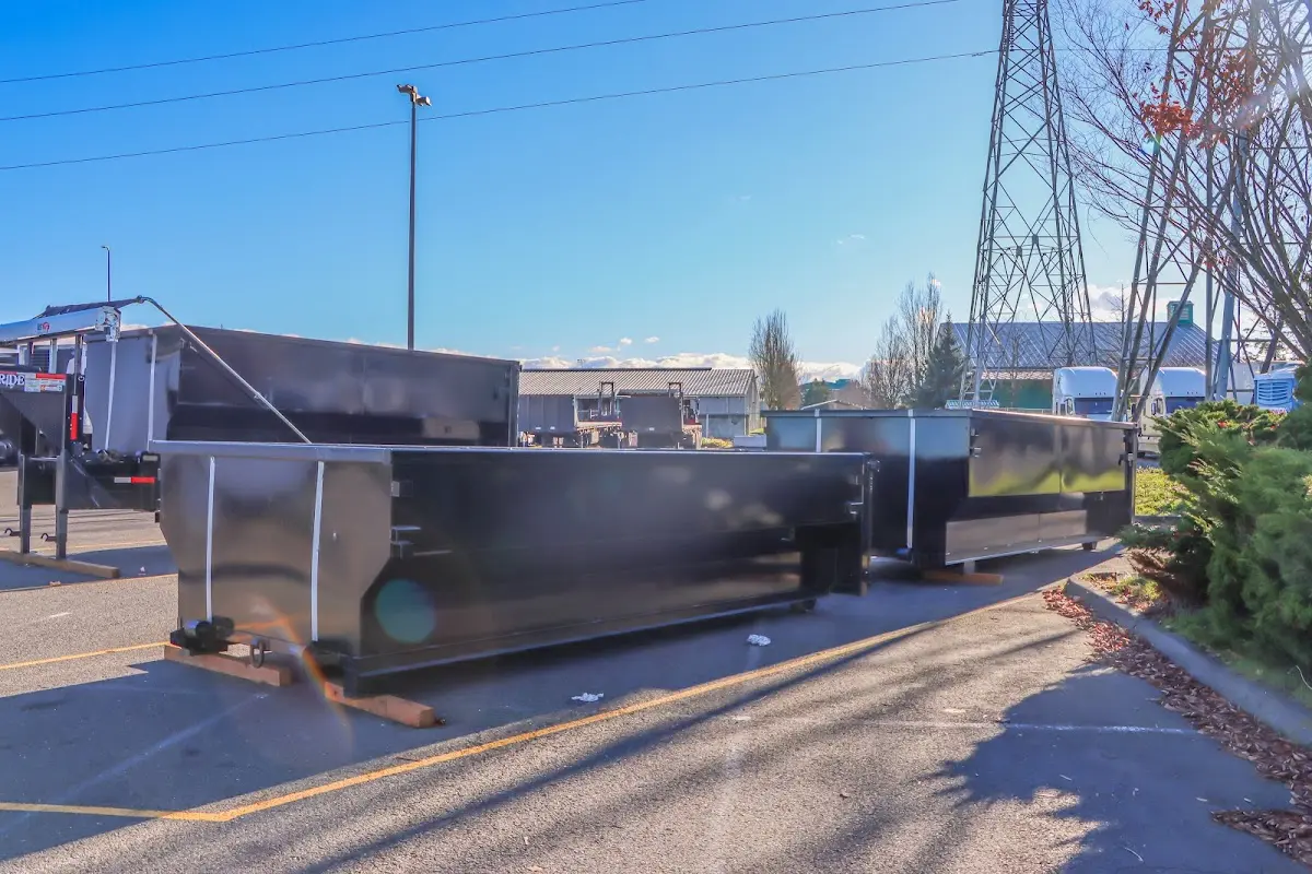 Roll-off dumpster ready for waste disposal at job site for Construction Dumpster Rental in Maple Valley